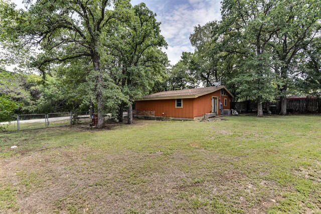108 5th St, Whitney, TX 76692 - view of yard featuring a gate