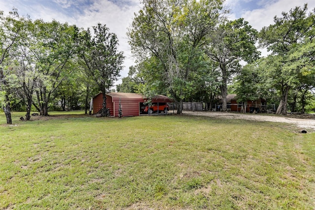 108 5th St, Whitney, TX 76692 - view of grassy yard with an outbuilding