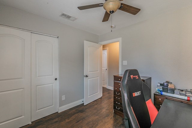 office area featuring ceiling fan and dark hardwood / wood-style flooring