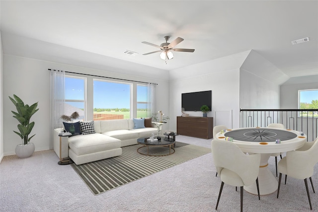 living room with light carpet, vaulted ceiling, and ceiling fan