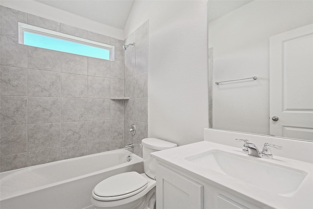 full bathroom with vanity, toilet, and tiled shower / bath