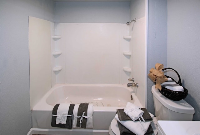 full bathroom featuring vanity, shower / washtub combination, and toilet