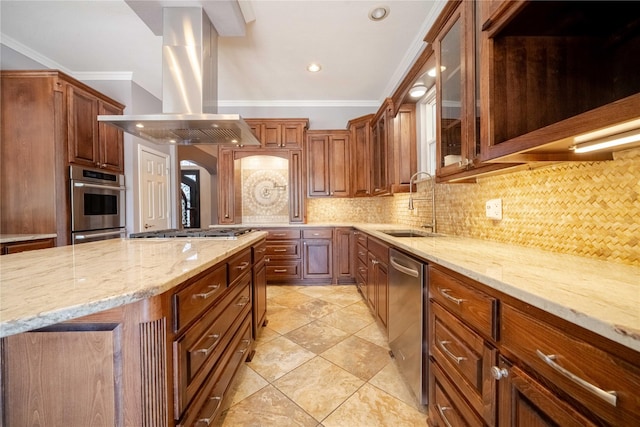 kitchen with sink, backsplash, stainless steel appliances, light stone countertops, and island exhaust hood