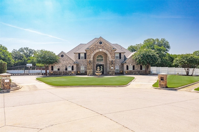 view of front of house with a front lawn