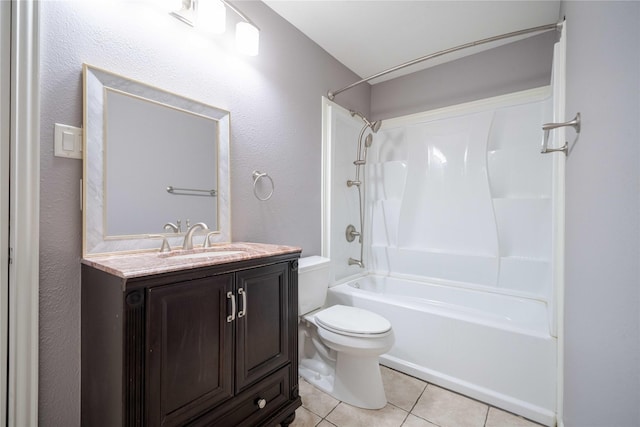 full bathroom featuring vanity, tile patterned floors, washtub / shower combination, and toilet