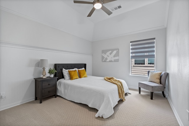 bedroom with ornamental molding, light colored carpet, and ceiling fan