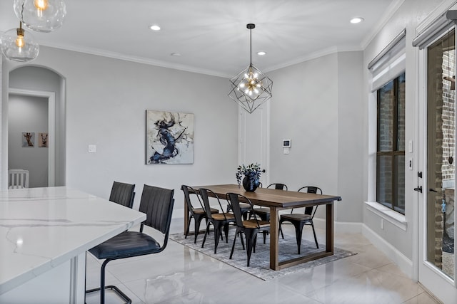 dining area featuring crown molding