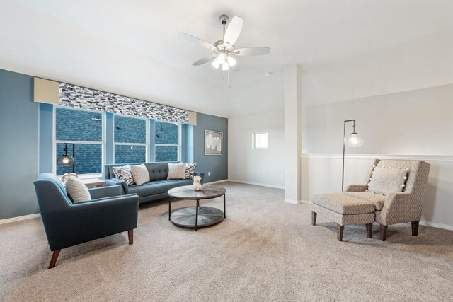 living room with ceiling fan and light carpet