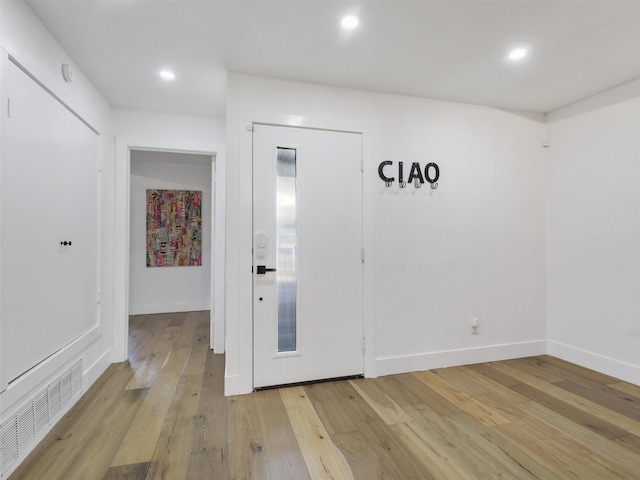 foyer with light wood-type flooring