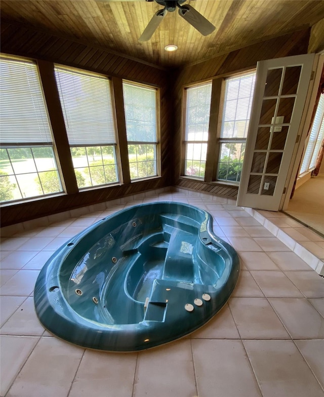 room details featuring ceiling fan, wood ceiling, and a hot tub