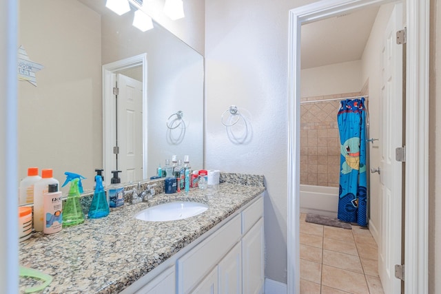 bathroom featuring vanity, shower / tub combo, and tile patterned floors