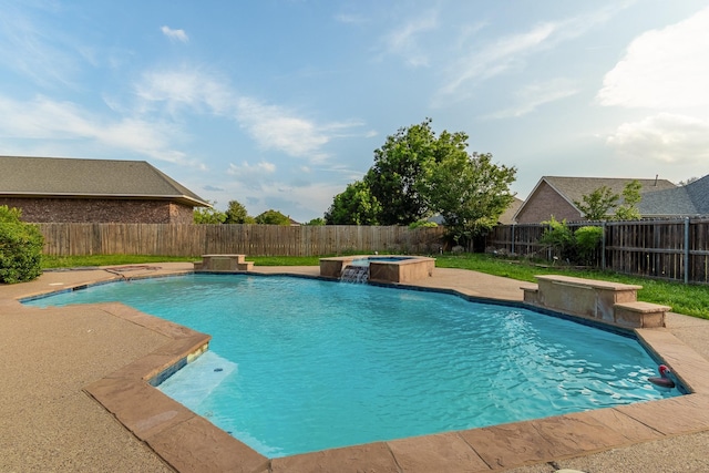 view of pool with an in ground hot tub and pool water feature