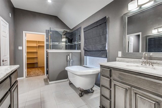 bathroom with lofted ceiling, vanity, and plus walk in shower