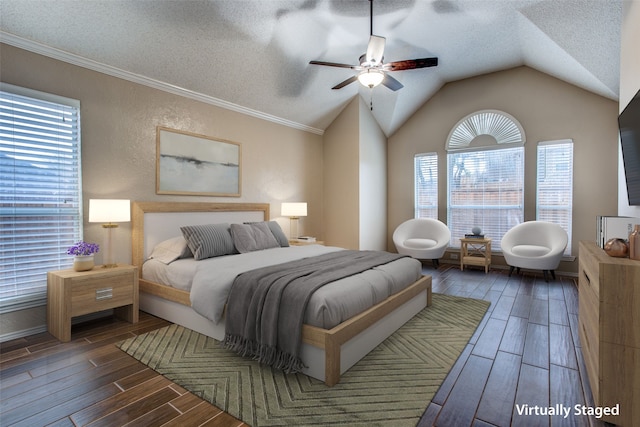 bedroom with multiple windows and a textured ceiling