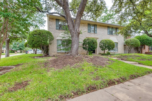 view of front of home featuring a front lawn