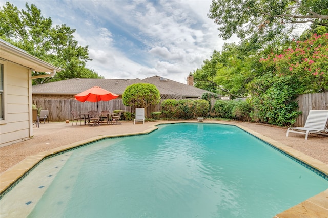 view of pool with a patio