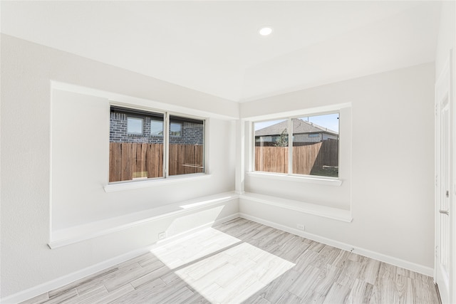 empty room featuring light hardwood / wood-style floors