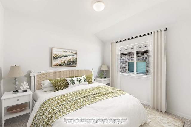 bedroom featuring vaulted ceiling