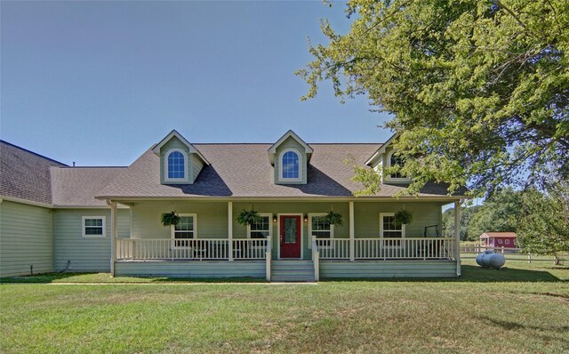 view of front facade featuring a porch and a front lawn