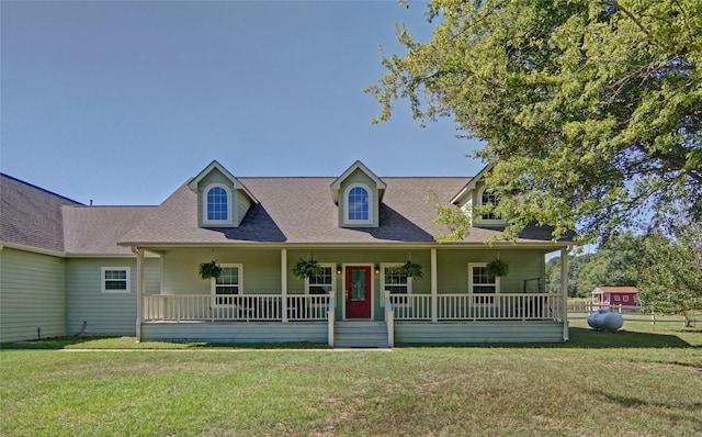 view of front of property featuring a porch and a front lawn