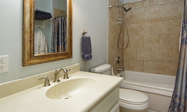 full bathroom featuring shower / tub combo, toilet, and vanity