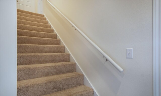 stairs with carpet floors