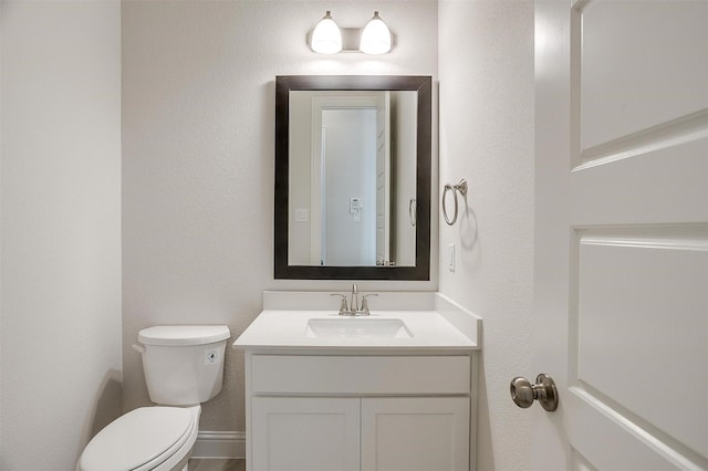 3834 Foot Hls, Midlothian, TX 76065 - half bath with toilet, vanity, and a textured wall