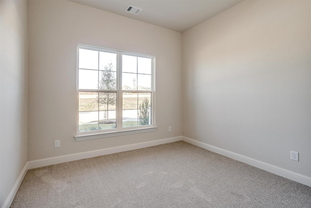 empty room featuring carpet floors