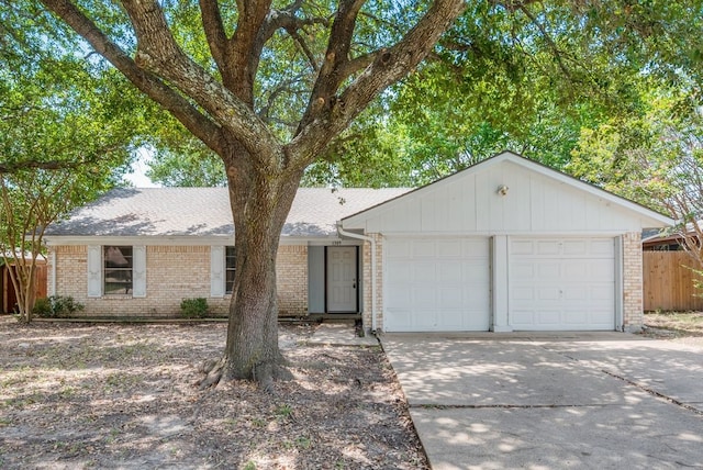 ranch-style house featuring a garage