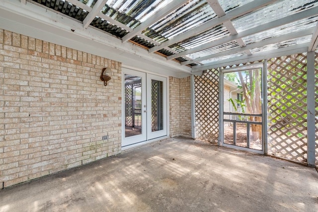 view of patio with a pergola and french doors