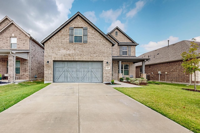 view of front of property with a garage and a front lawn