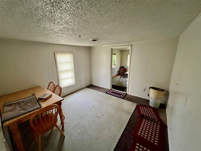 interior space with a textured ceiling