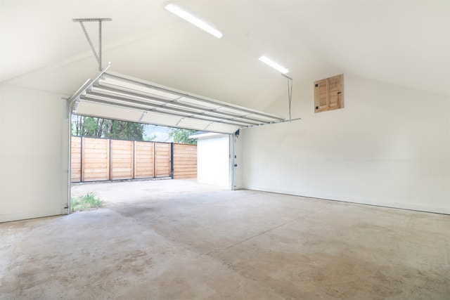 garage featuring a carport