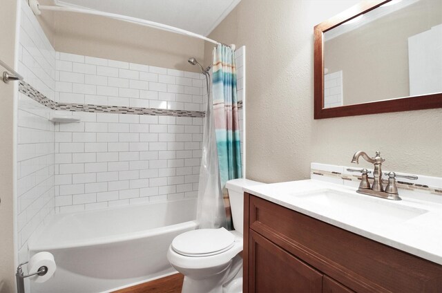 full bathroom featuring vanity, toilet, and shower / bathtub combination with curtain