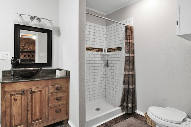 bathroom with vanity, toilet, a shower with shower curtain, and crown molding