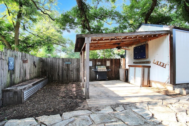 view of patio with ceiling fan