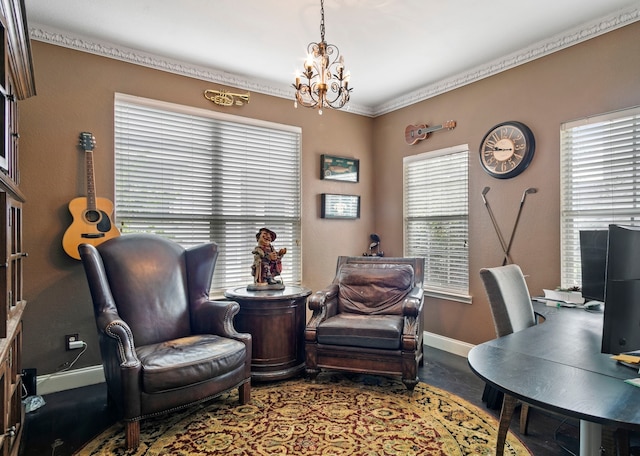 home office with crown molding and a chandelier