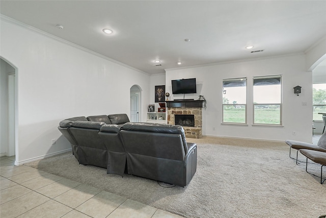 tiled living room featuring a fireplace and ornamental molding