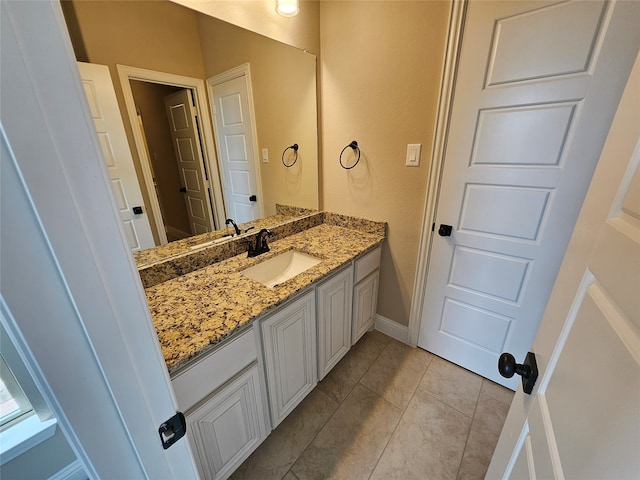 bathroom featuring vanity and tile patterned floors