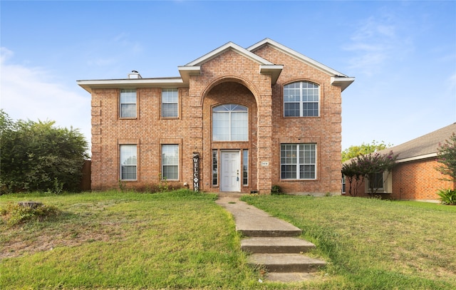 view of front facade with a front yard