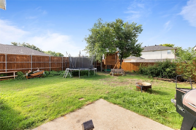 view of yard featuring a trampoline