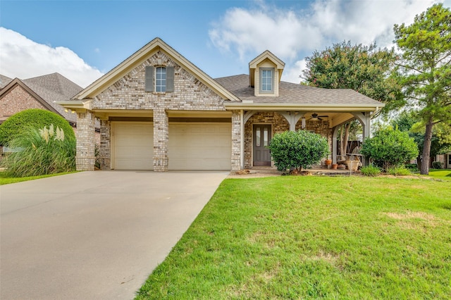 view of front of house featuring a garage and a front yard