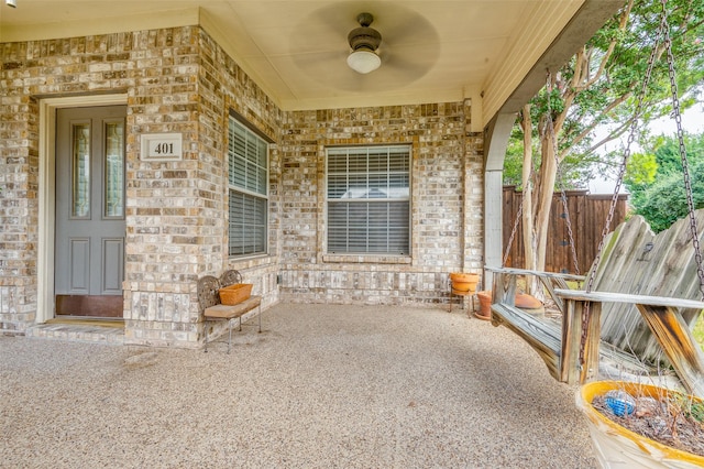 view of patio featuring ceiling fan