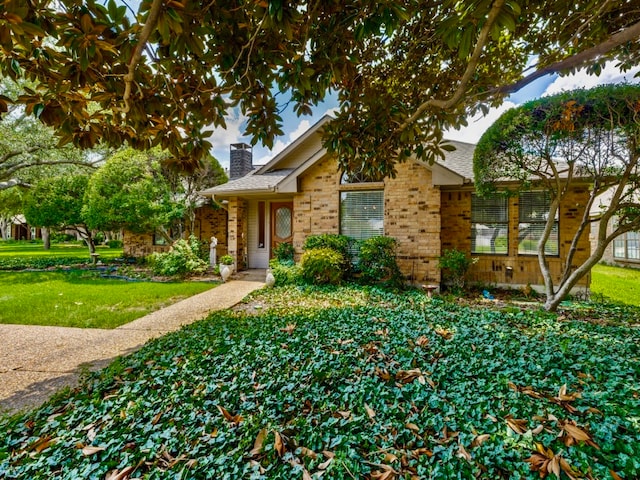 view of front of home with a front yard