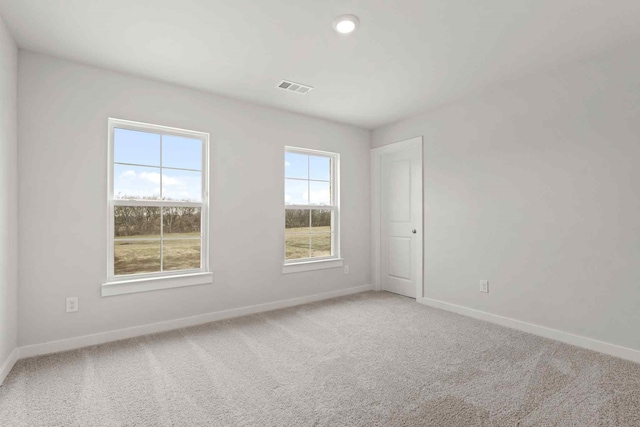 view of carpeted spare room