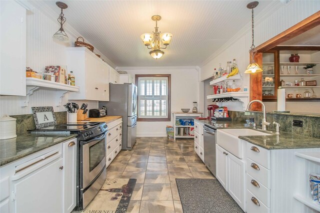 kitchen with white cabinetry, tile patterned flooring, pendant lighting, and stainless steel appliances