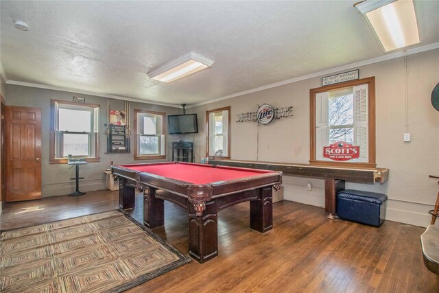 rec room featuring pool table, hardwood / wood-style floors, and ornamental molding