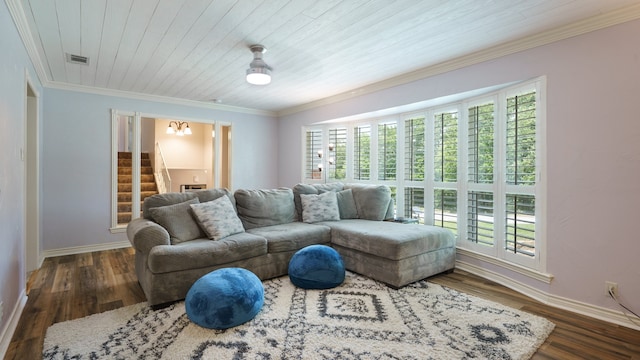 living room featuring dark wood-type flooring and ornamental molding