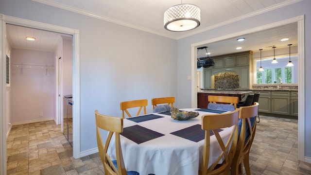 tiled dining room with ornamental molding