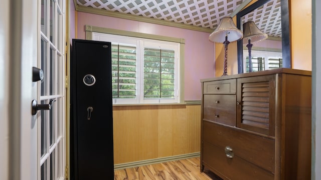 interior space featuring light hardwood / wood-style flooring and ornamental molding